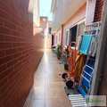 Sobrado em Praia Grande, bairro Ocian