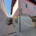 Sobrado em Praia Grande, bairro Tude Bastos