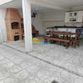 Casa em Praia Grande, bairro Maracanã