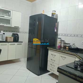 Casa em Praia Grande, bairro Caiçara