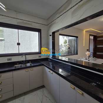 Casa em Praia Grande, bairro Caiçara