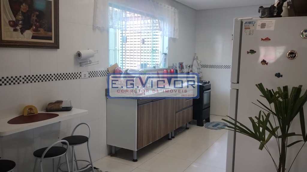 Sobrado em Praia Grande, no bairro Caiçara