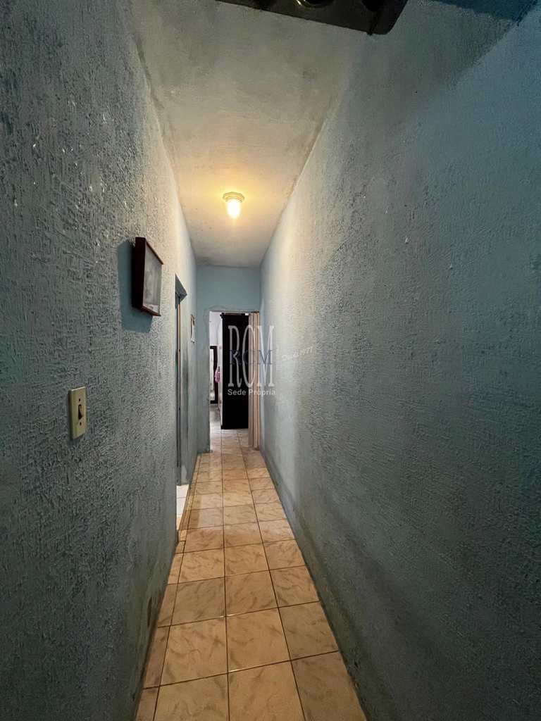 Casa em São Vicente, no bairro Vila Voturua