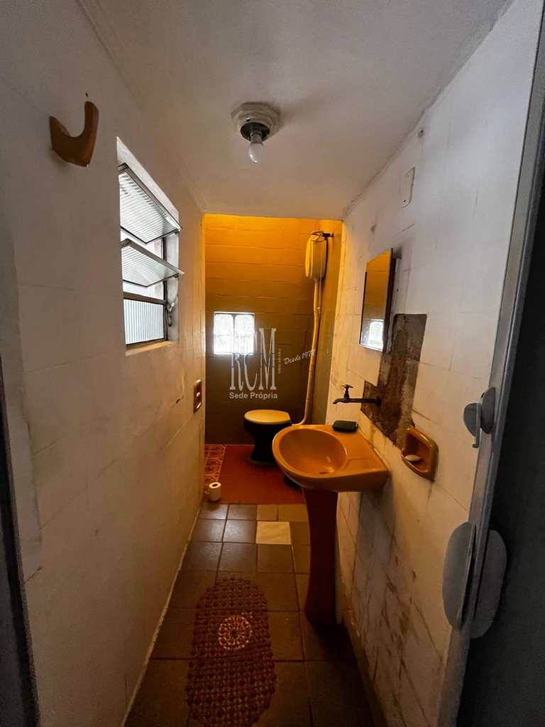 Casa em São Vicente, no bairro Vila Voturua