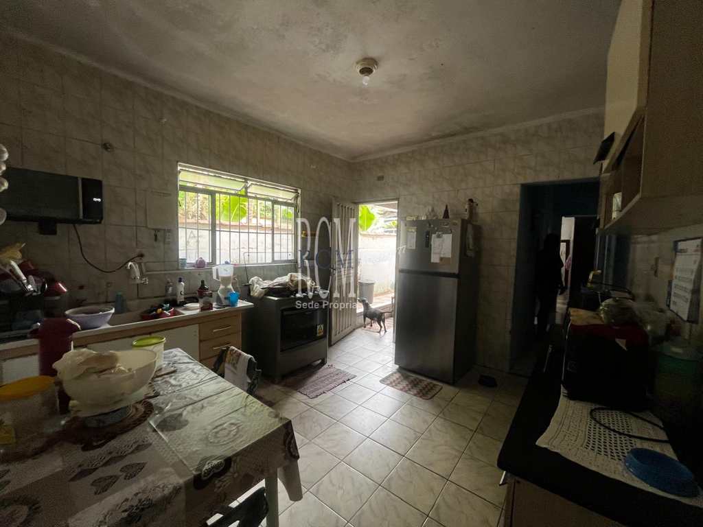 Casa em São Vicente, no bairro Vila Voturua