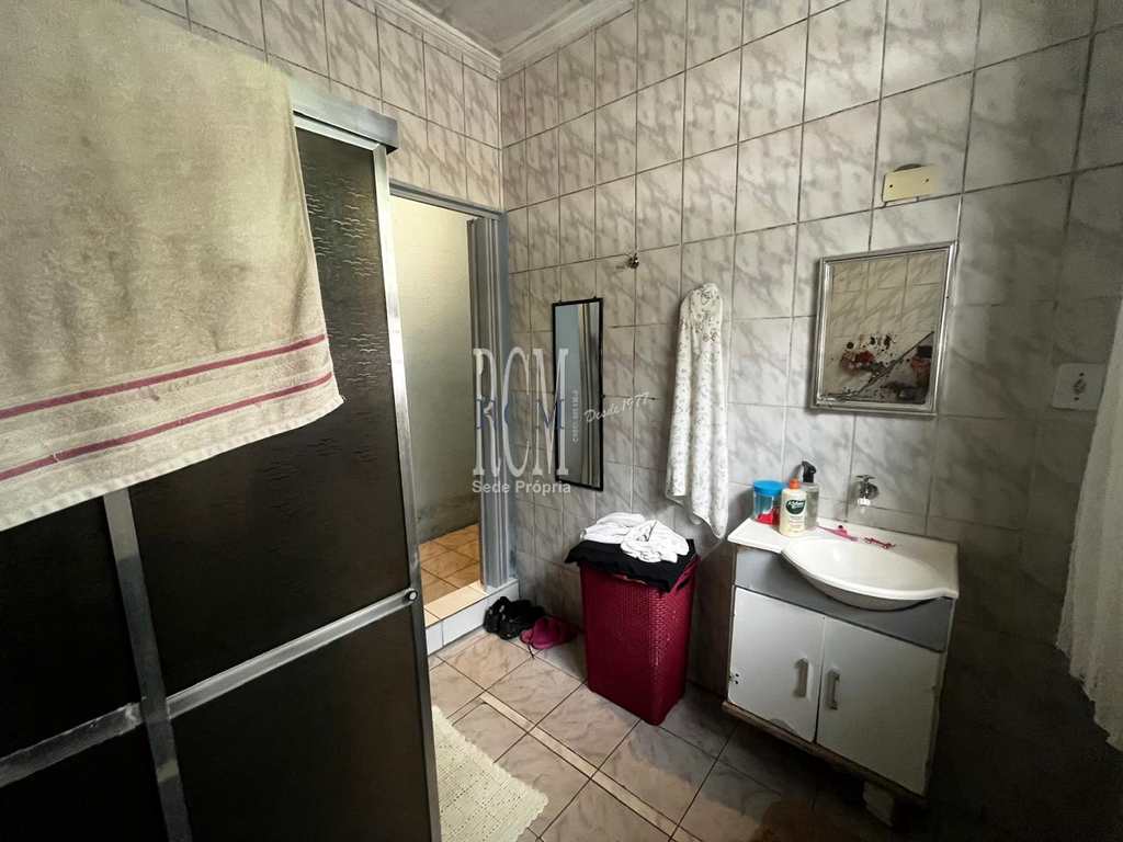 Casa em São Vicente, no bairro Vila Voturua
