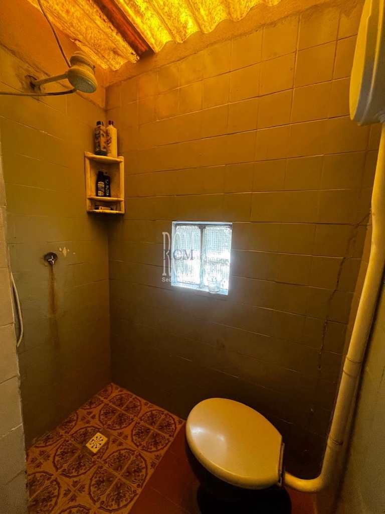 Casa em São Vicente, no bairro Vila Voturua