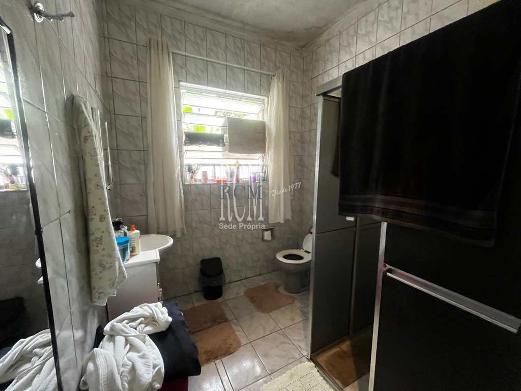 Casa em São Vicente, no bairro Vila Voturua