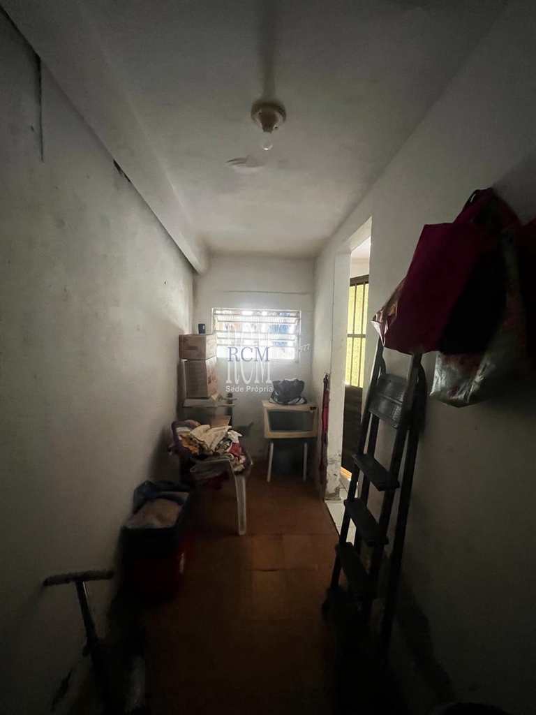 Casa em São Vicente, no bairro Vila Voturua