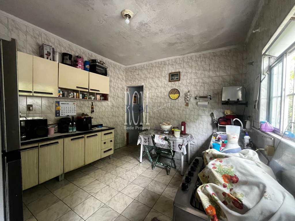 Casa em São Vicente, no bairro Vila Voturua