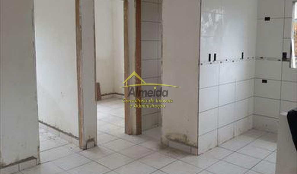 Casa em Praia Grande, bairro Tude Bastos