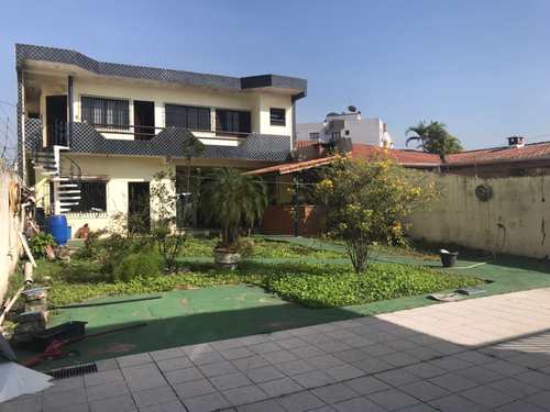 Sobrado, código 662696 em Praia Grande, bairro Guilhermina