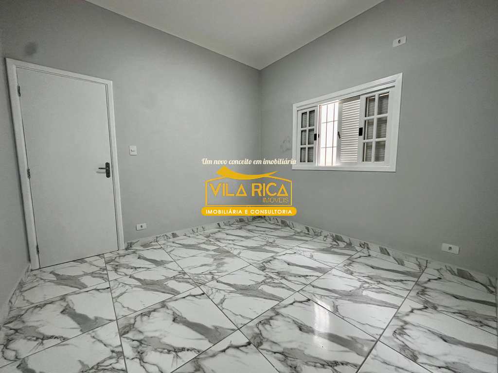 Casa em Praia Grande, no bairro Caiçara
