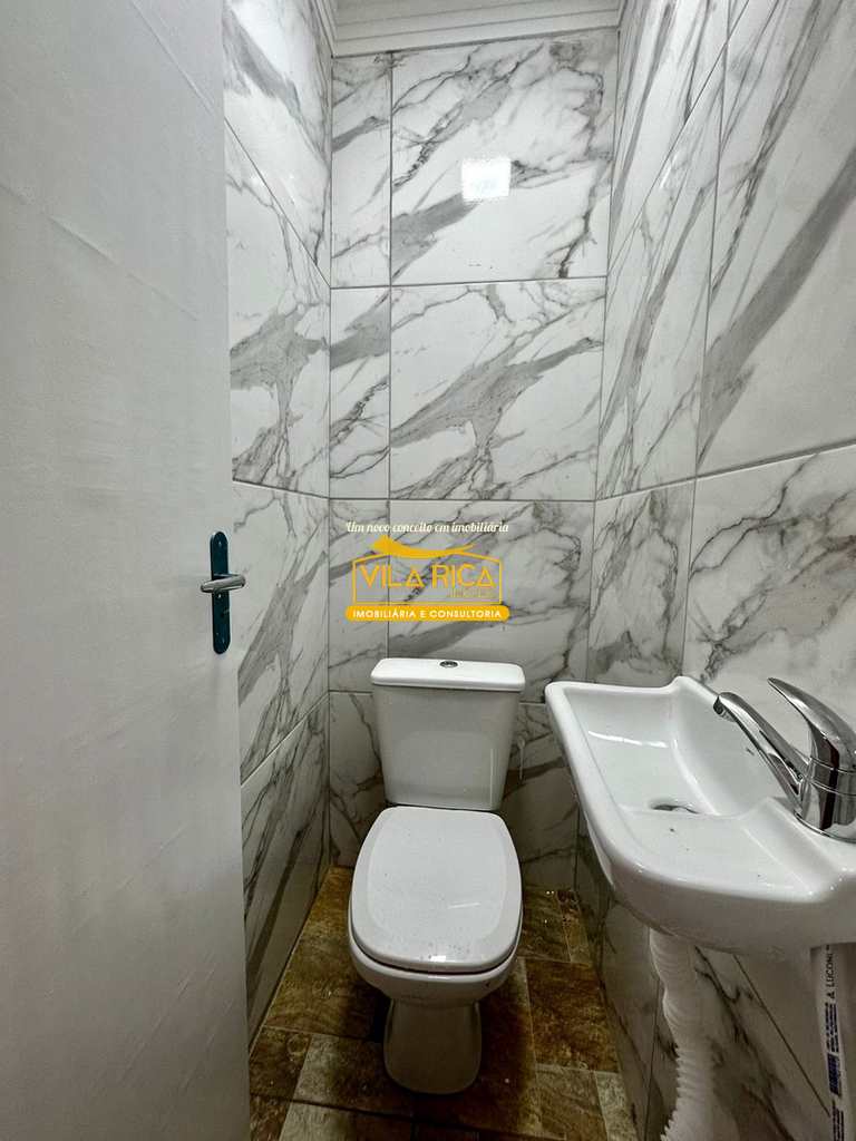 Casa em Praia Grande, no bairro Caiçara