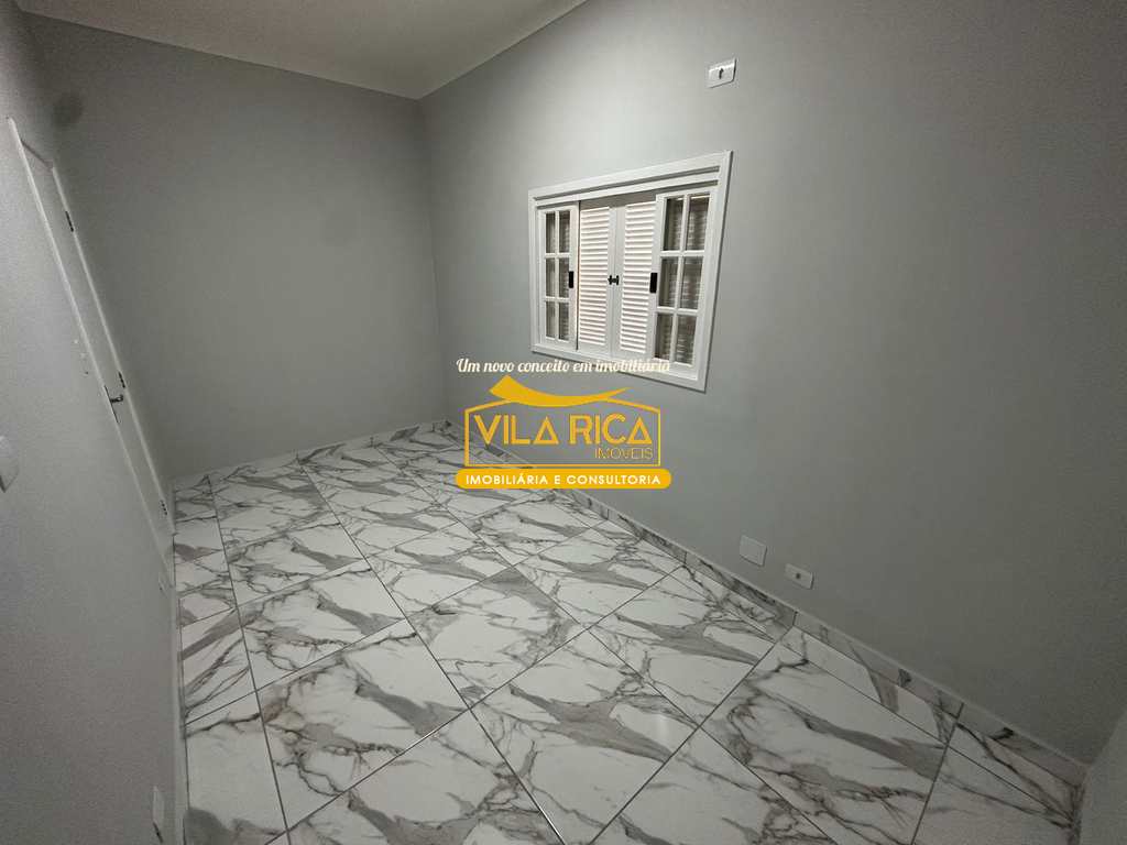 Casa em Praia Grande, no bairro Caiçara