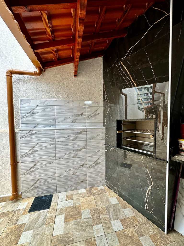 Casa em Praia Grande, no bairro Caiçara