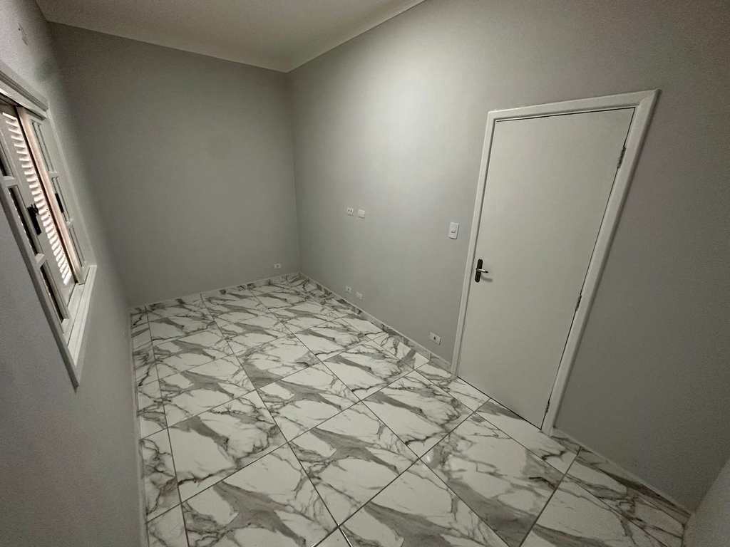 Casa em Praia Grande, no bairro Caiçara