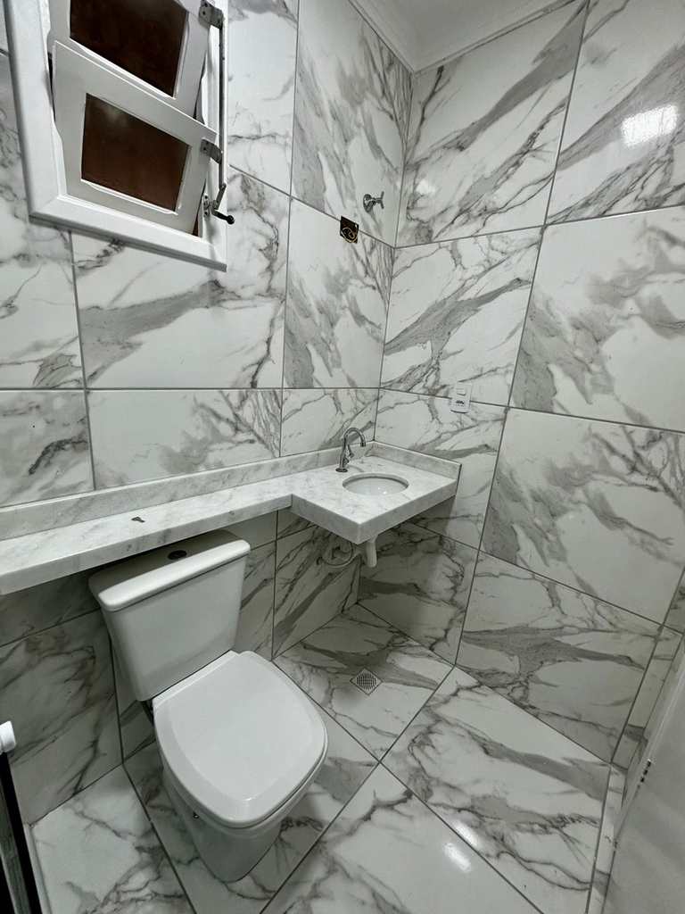 Casa em Praia Grande, no bairro Caiçara