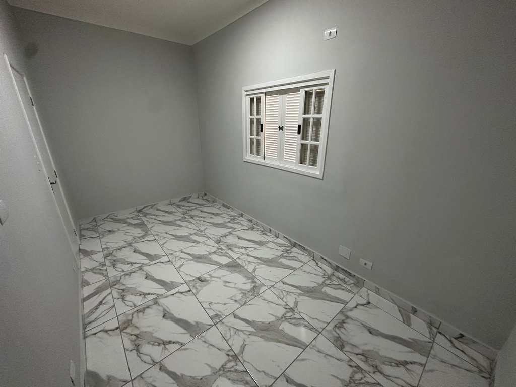 Casa em Praia Grande, no bairro Caiçara