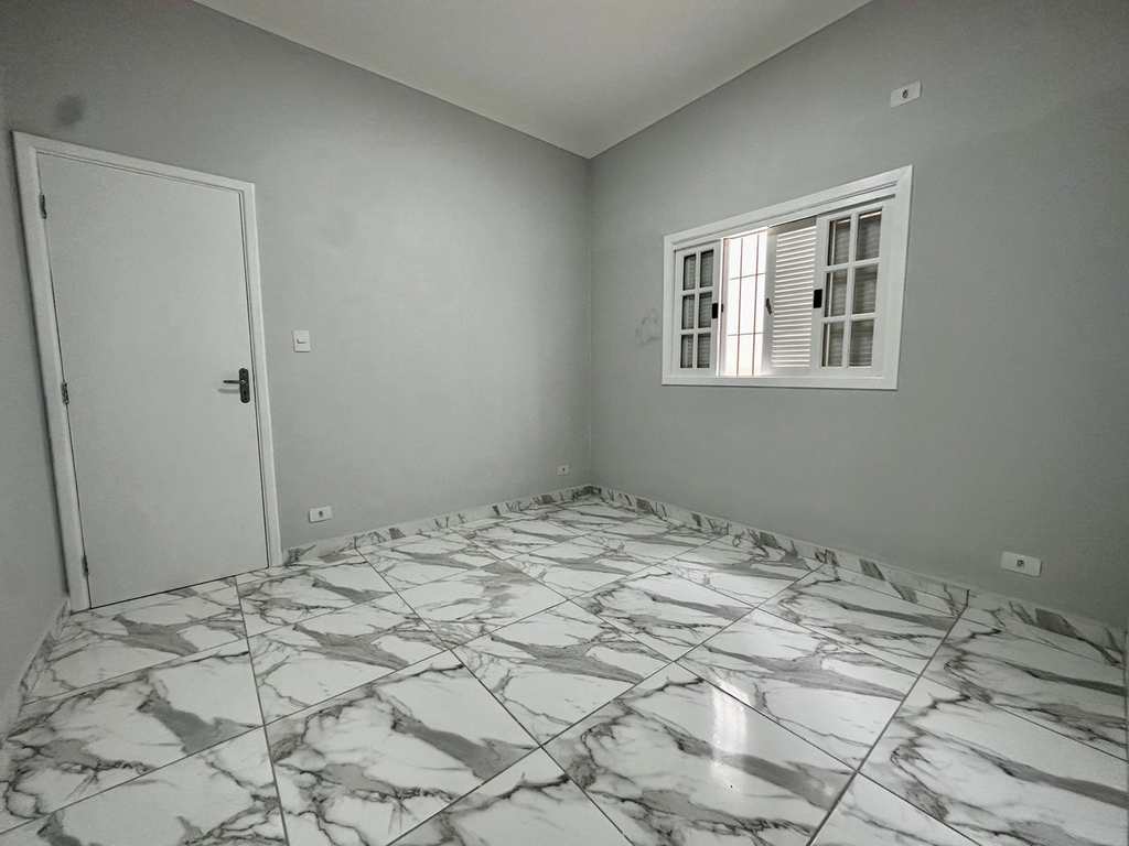 Casa em Praia Grande, no bairro Caiçara