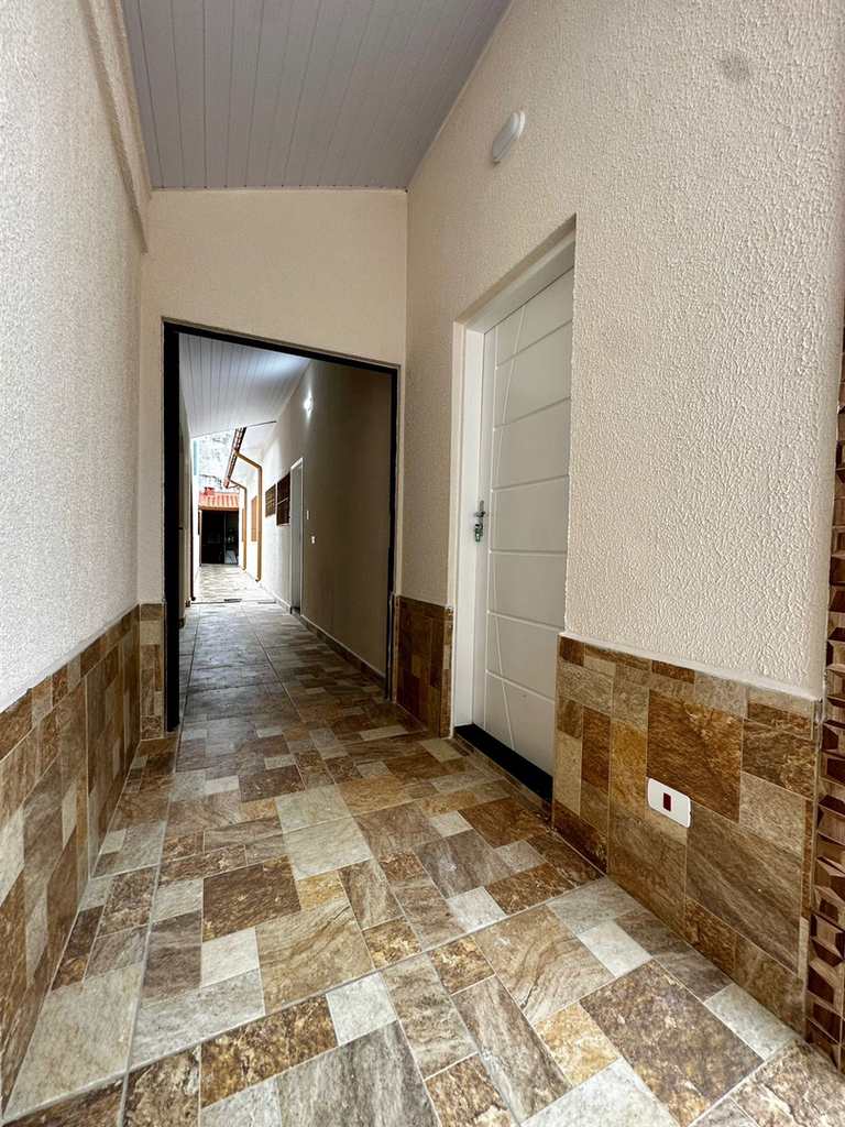 Casa em Praia Grande, no bairro Caiçara