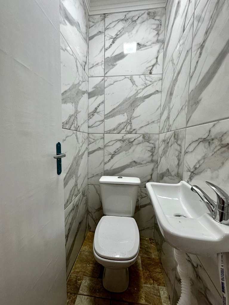 Casa em Praia Grande, no bairro Caiçara