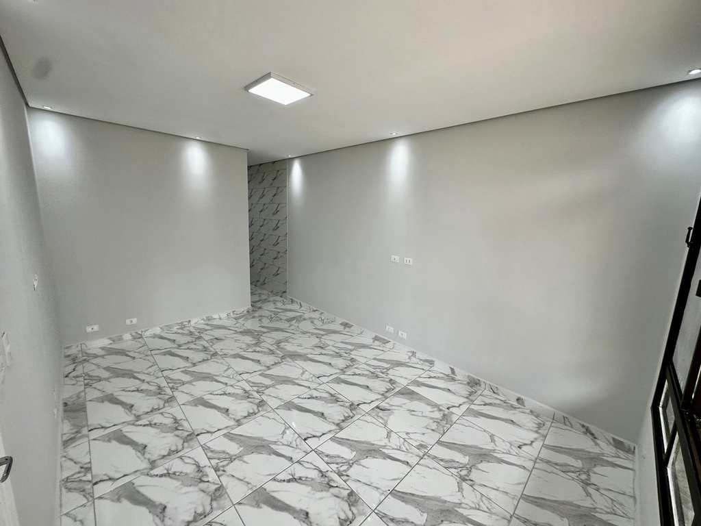 Casa em Praia Grande, no bairro Caiçara