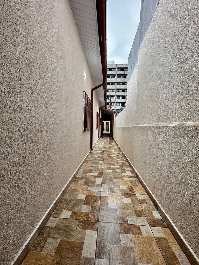 Casa em Praia Grande, no bairro Caiçara