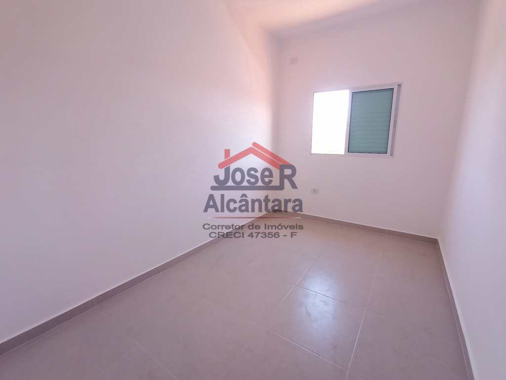 Sobrado em Praia Grande, no bairro Caiçara