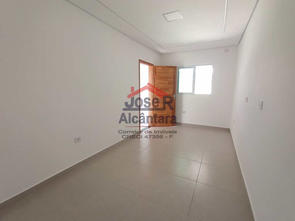 Sobrado em Praia Grande, no bairro Caiçara