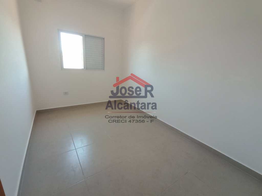 Sobrado em Praia Grande, no bairro Caiçara