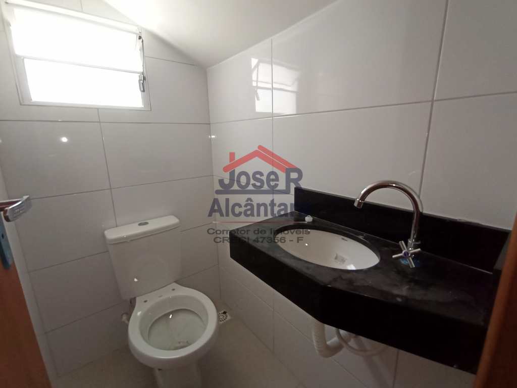 Sobrado em Praia Grande, no bairro Caiçara