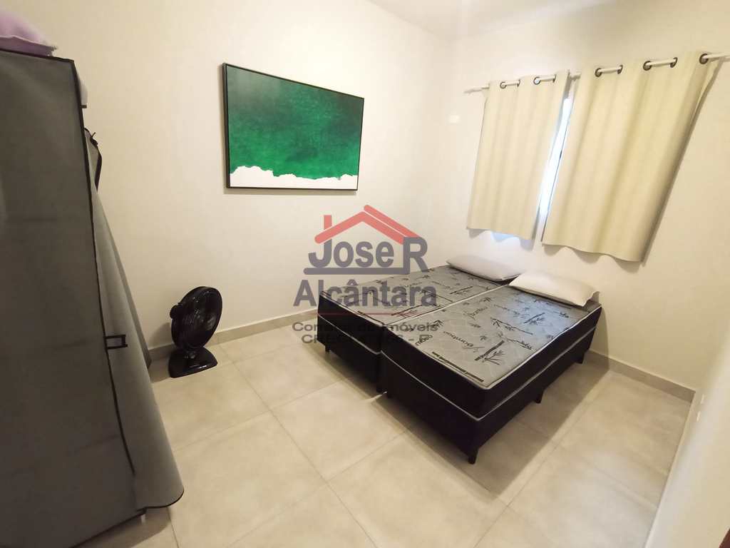 Casa de Condomínio em Praia Grande, no bairro Esmeralda
