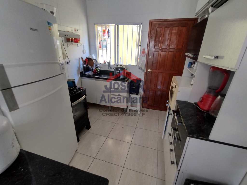 Casa de Condomínio em Praia Grande, no bairro Melvi