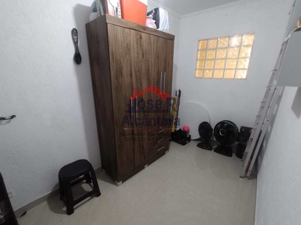 Casa em Praia Grande, no bairro Tupiry