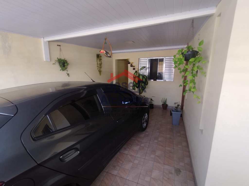 Casa em Praia Grande, no bairro Tupiry