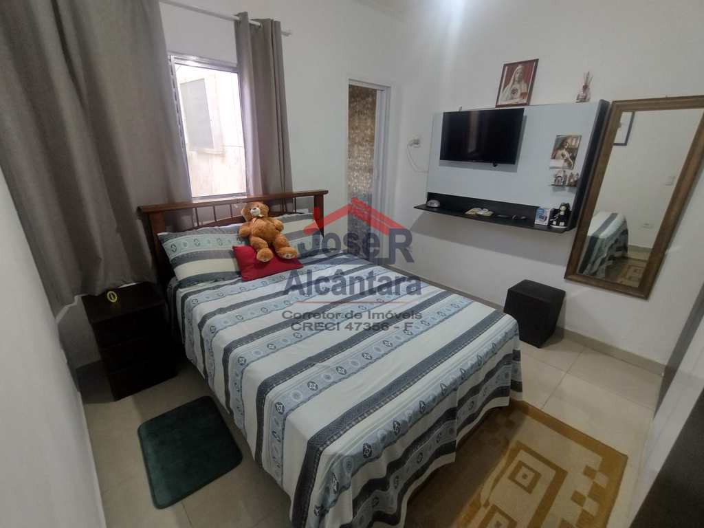 Casa em Praia Grande, no bairro Tupiry