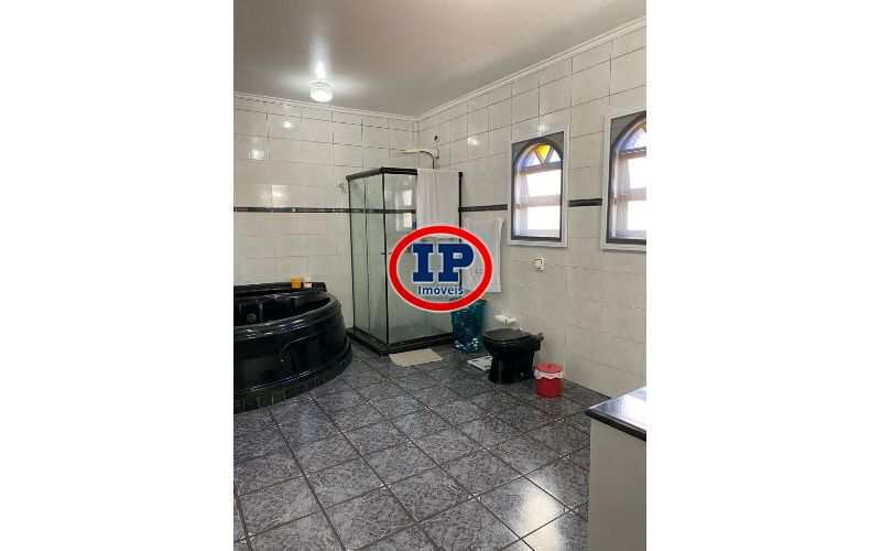 Sobrado em Praia Grande, no bairro Caiçara