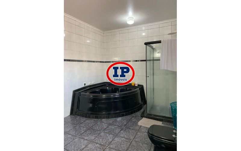 Sobrado em Praia Grande, no bairro Caiçara