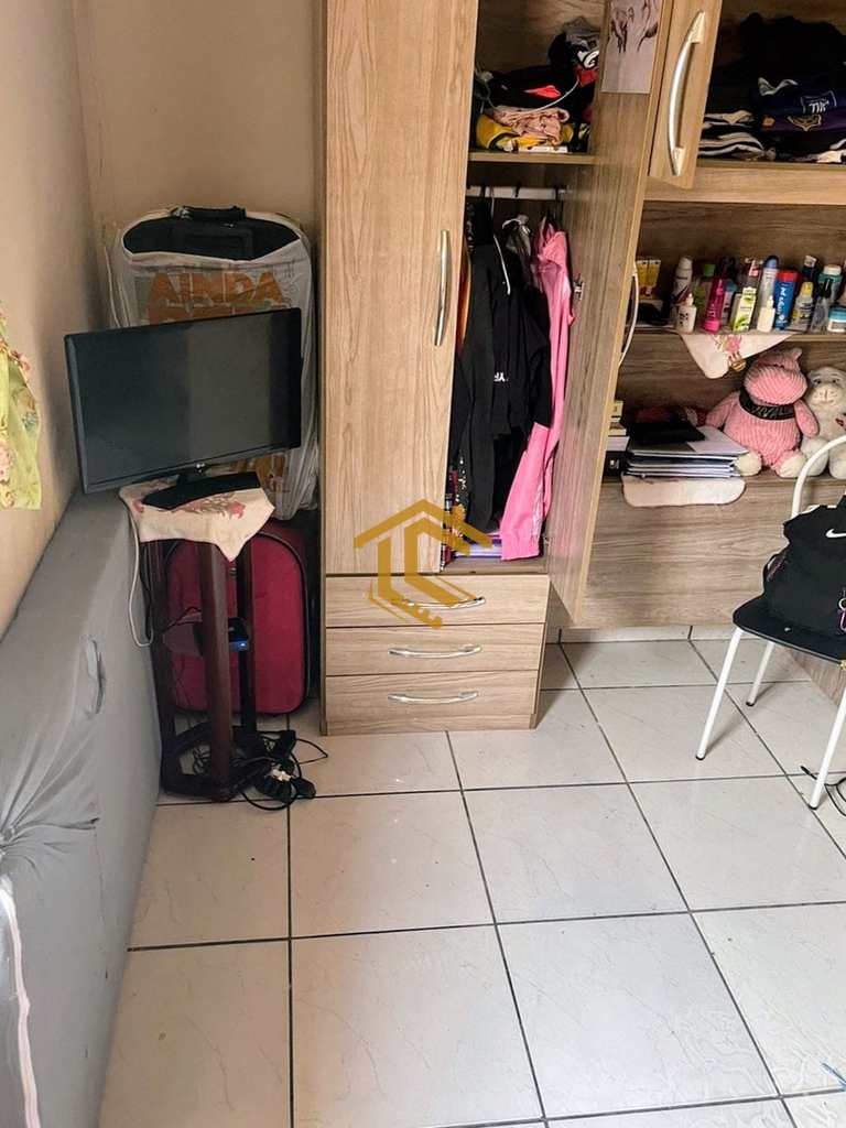 Casa em Praia Grande, no bairro Caiçara