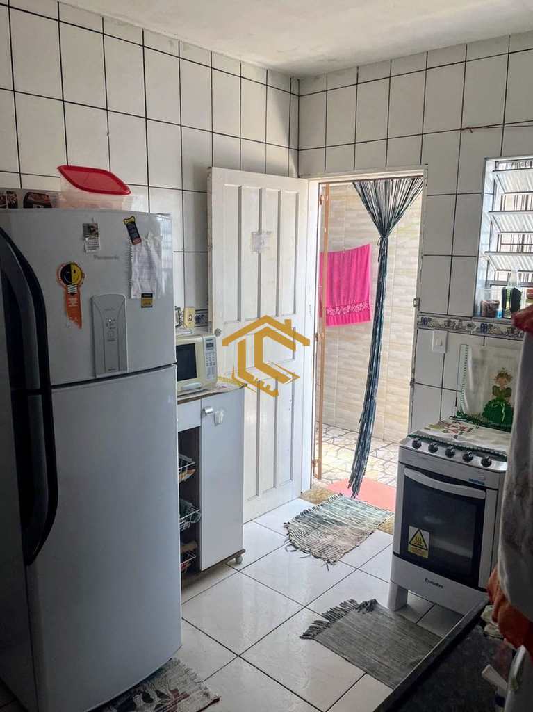 Casa em Praia Grande, no bairro Caiçara