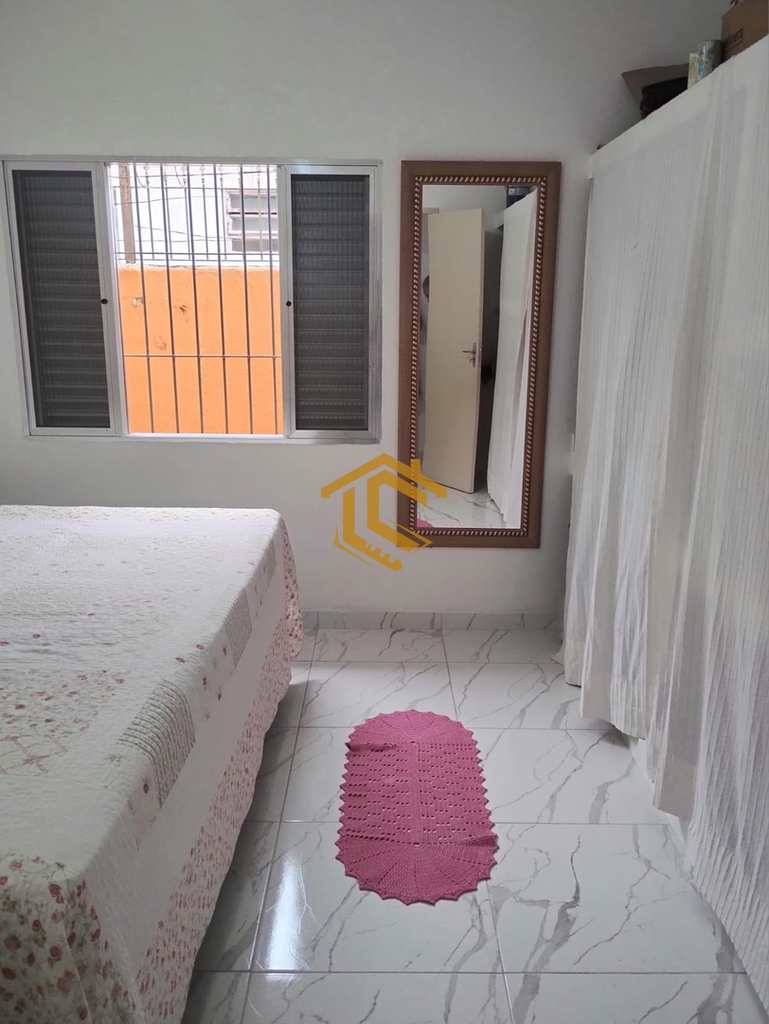 Casa em Praia Grande, no bairro Caiçara