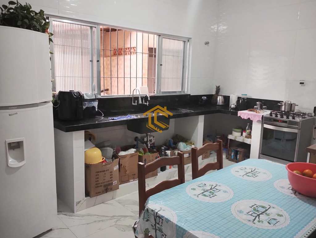 Casa em Praia Grande, no bairro Caiçara
