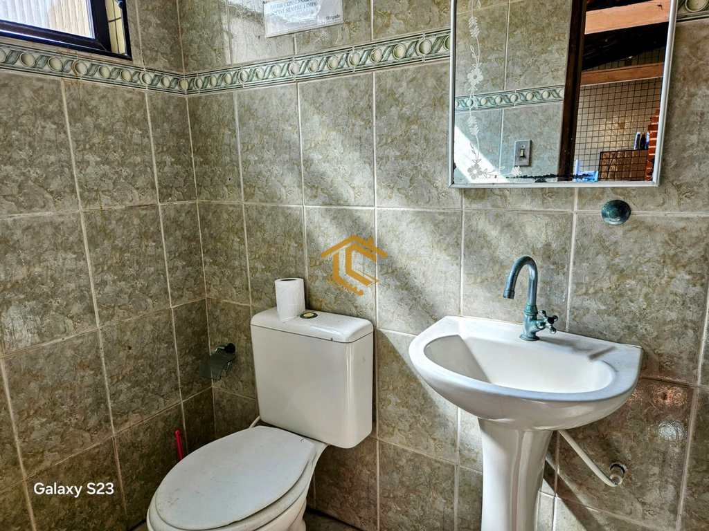 Casa em Praia Grande, no bairro Caiçara