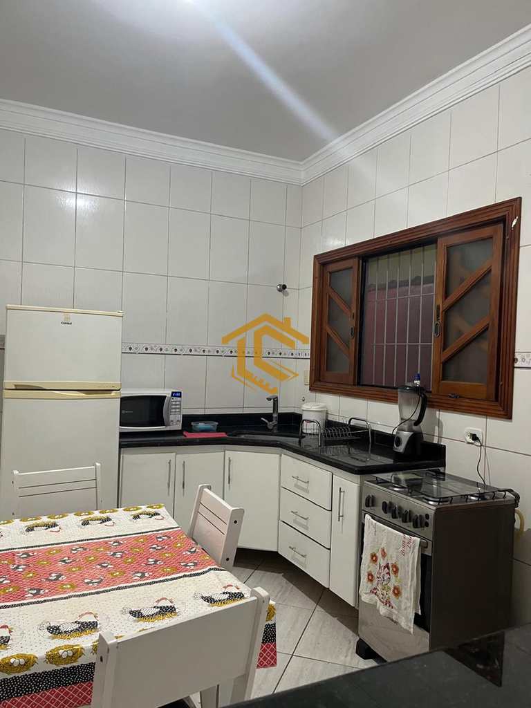 Casa em Praia Grande, no bairro Caiçara
