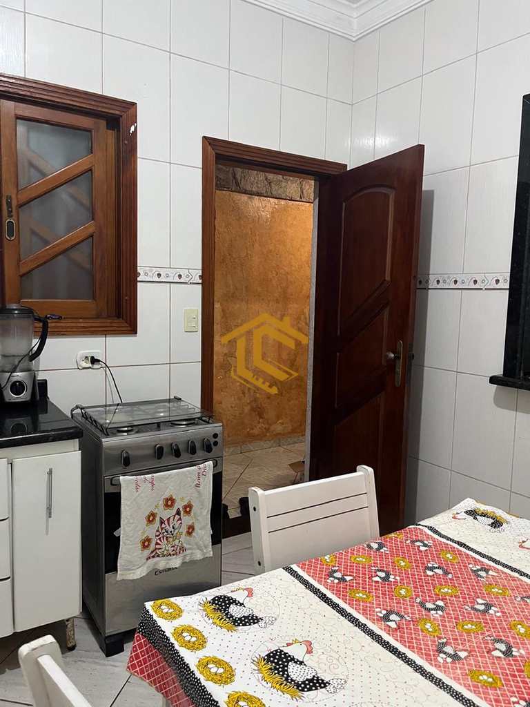Casa em Praia Grande, no bairro Caiçara
