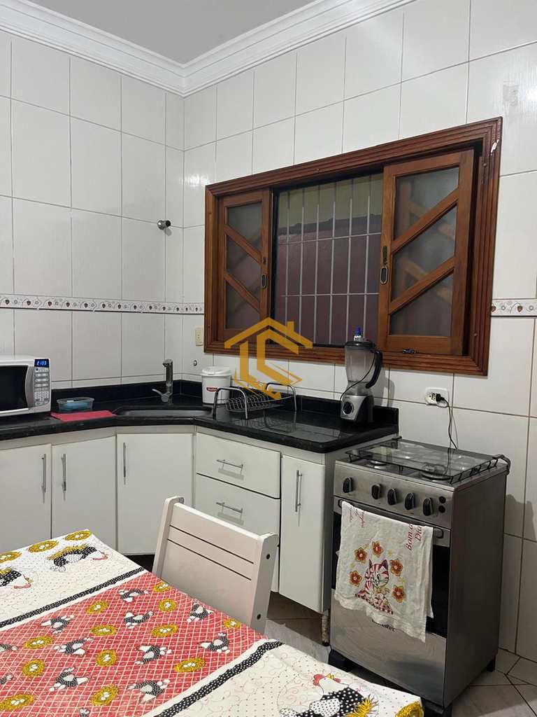 Casa em Praia Grande, no bairro Caiçara