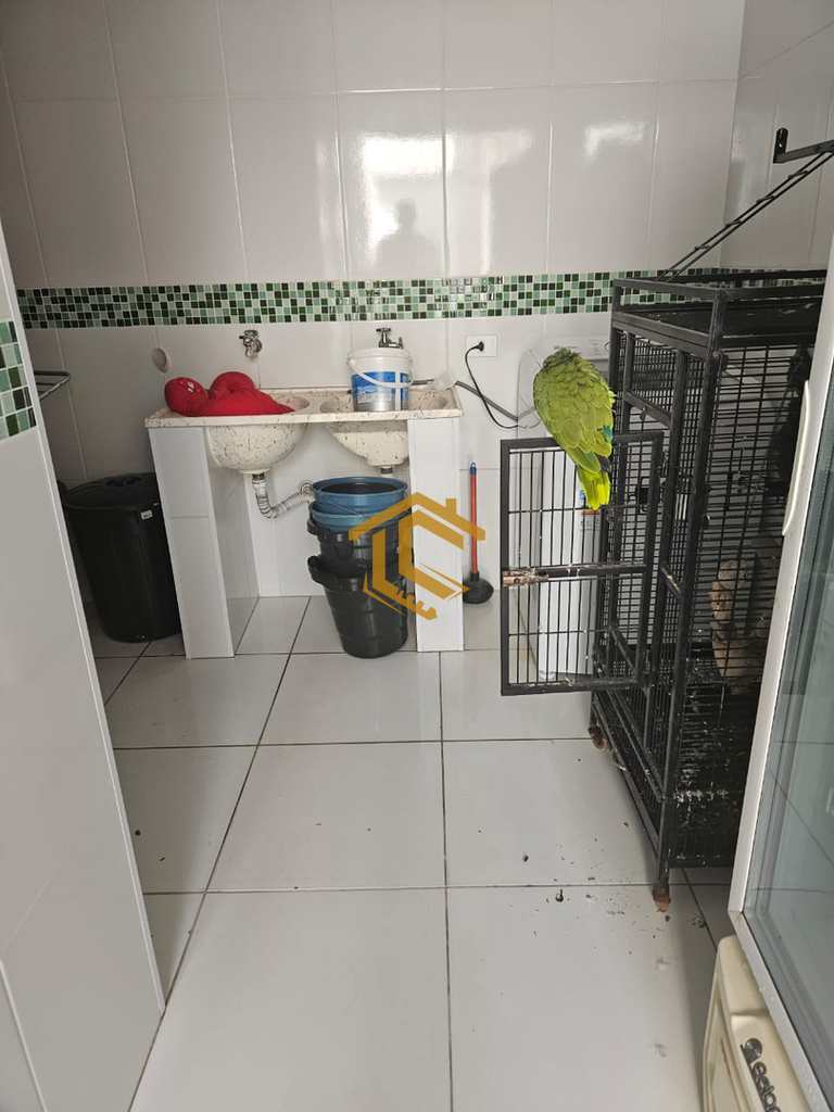 Casa em Praia Grande, no bairro Ocian