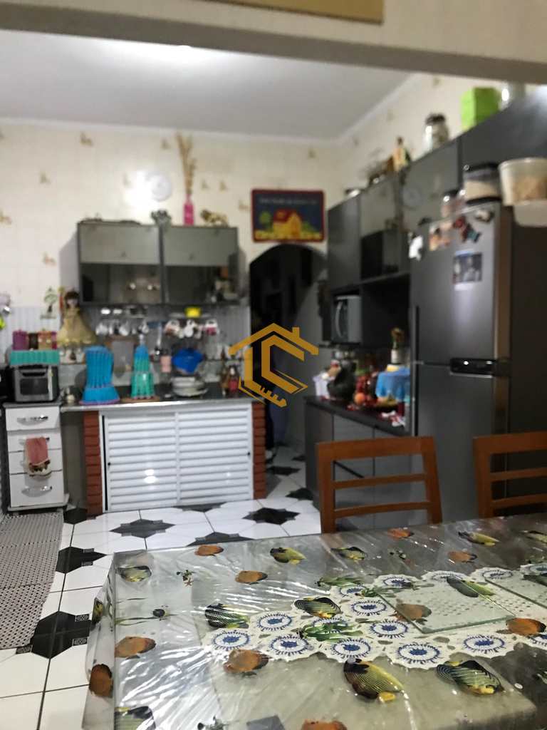 Casa em Praia Grande, no bairro Caiçara