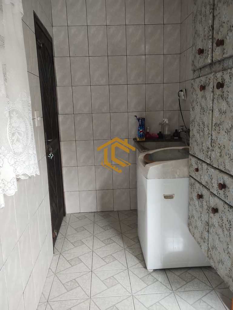 Casa em Praia Grande, no bairro Caiçara